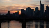 A stand-up paddler enjoys the first warm spring evening as the spread of the coronavirus disease (COVID-19) continues in Frankfurt, Germany, March 24, 2021. REUTERS/Kai Pfaffenbach
