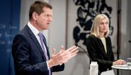 Soeren Brostroem, director of the National Board of Health, and Tanja Erichsen of the Danish Medicines Agency attend a media briefing on the future use of the AstraZeneca COVID-19 vaccine, in Copenhagen, Denmark March 25, 2021. Mads Claus Rasmussen/Ritzau