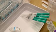 Syringes containing Pfizer-BioNTech coronavirus disease (COVID-19) vaccine are seen at the Impfzentrum Basel Stadt vaccination center, at the Congress Center of the Messe Basel fairground in Basel in Basel, Switzerland March 18, 2021. REUTERS/Arnd Wiegman