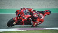 Francesco Bagnaia in action during qualifying for Barwa Grand Prix of Qatar at Losail International Circuit, yesterday. DOWN: Bagnaia gestures during the qualifying stage.  