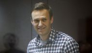 FILE PHOTO: Russian opposition leader Alexei Navalny attends a hearing to consider an appeal against an earlier court decision to change his suspended sentence to a real prison term, in Moscow, Russia February 20, 2021. REUTERS/Maxim Shemetov/File Photo
