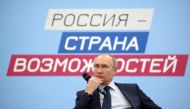 Russian President Vladimir Putin attends a session of the supervisory council of 
