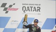 Monster Energy Yamaha MotoGP's Spanish rider Maverick Vinales celebrates after winning the MotoGP Barwa Grand Prix of Qatar at the Losail International Circuit, yesterday. 