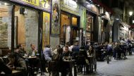 Tourists dine outdoors, as Madrid's more relaxed COVID-19 policies attract European tourists who are escaping lockdowns due to the coronavirus disease (COVID-19), in Madrid, Spain, March 27, 2021. REUTERS/Javier Barbancho
