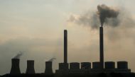 Smoke rises from the Duvha coal-based power station owned by state power utility Eskom, in Mpumalanga province, South Africa, 18 February, 2020. REUTERS/Mike Hutchings/File Photo