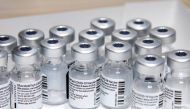 File photo: Empty vials of the Pfizer-BioNTech coronavirus disease (COVID-19) vaccine are seen at The Michener Institute, in Toronto, Canada January 4, 2021. REUTERS/Carlos Osorio/File Photo