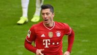 March 20, 2021 Bayern Munich's Robert Lewandowski celebrates scoring their fourth goal and completing his hat-trick Pool via REUTERS/Matthias Balk DFL regulations prohibit any use of photographs as image sequences and/or quasi-video./File Photo