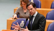 Dutch Prime Minister Mark Rutte attends a debate over remarks he made during talks to form a new government following the March 17 national elections, in The Hague, Netherlands April 2, 2021. REUTERS/Piroschka van de Wouw