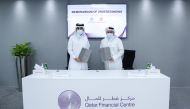 Misnad bin Abdullatif Al Misnad, Chief Executive Officer, QCSD (left) and Yousuf Mohamed Al Jaida, Chief Executive Officer, QFC Authority during the signing of MoU to support the development of Qatari financial market.