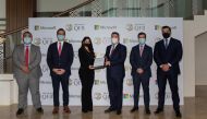 Lana Khalaf, Country Manager, Microsoft Qatar and Ayman Zaidan, Deputy Chief Executive Officer & Chief Investment Officer, QFB with other officials during exchange of agreements between Microsoft and QFB on mobile application. 
