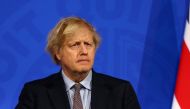 Britain's Prime Minister Boris Johnson holds a news conference on the coronavirus disease (COVID-19) pandemic, in London, Britain March 29, 2021. Hollie Adams/Pool via REUTERS/File Photo