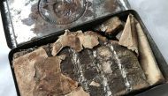 A 121-year-old chocolate bar from a batch commissioned by Queen Victoria for British troops fighting in South Africa is seen in an undated photo at Oxburgh Hall, a manor house in Norfolk, Britain where it was found in the attic. National Trust/Victoria Mc