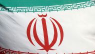 The Iranian flag waves in front of the International Atomic Energy Agency (IAEA) headquarters in Vienna, Austria, March 1, 2021. Reuters/Lisi Niesner/File Photo/File Photo