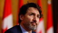 FILE PHOTO: Canada's Prime Minister Justin Trudeau looks on during a news conference in Ottawa, Ontario, Canada March 30, 2021. REUTERS/Blair Gable/File Photo
