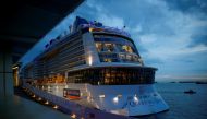 File photo: Royal Caribbean's Quantum of the Seas cruise ship is moored at Marina Bay Cruise Center after a passenger tested positive for coronavirus disease during a cruise to nowhere, in Singapore, December 9, 2020. Reuters/Edgar Su/File Photo