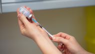 A nurse prepares a dose of the Moderna coronavirus disease (COVID-19) vaccine at the Glangwili General Hospital in Carmarthen, Wales, Britain April 7, 2021. Jacob King/Pool via REUTERS
