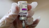 FILE PHOTO: A medical worker prepares a dose of AstraZeneca COVID-19 vaccine at a vaccination center, amid the coronavirus disease outbreak, in Ronquieres, Belgium April 6, 2021. REUTERS/Yves Herman/File Photo
