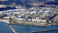 An aerial view shows the storage tanks for treated water at the tsunami-crippled Fukushima Daiichi nuclear power plant in Okuma town, Fukushima prefecture, Japan February 13, 2021, in this photo taken by Kyodo. Picture taken February 13, 2021. Kyodo/via R