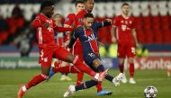 Soccer Football - Champions League - Quarter Final Second Leg - Paris St Germain v Bayern Munich - Parc des Princes, Paris, France - April 13, 2021 Paris St Germain's Neymar in action with Bayern Munich's Alphonso Davies REUTERS/Christian Hartmann

