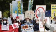 People rally to protest against the Japanese government's decision to discharge contaminated radioactive wastewater from Fukushima Daiichi nuclear power plant into the sea, in front of the Fukushima prefectural government headquarters in Fukushima, April 