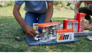 Children play with die-cast cars in this undated photo obtained by Reuters on April 14, 2021. Mattel/Handout via REUTERS