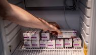 File photo: Staff member handles AstraZeneca COVID-19 vaccines in storage at Region Hovedstaden's Vaccine Center, Copenhagen, Denmark February 11, 2021. Ritzau Scanpix/Liselotte Sabroe via Reuters 
