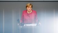 German Chancellor Angela Merkel speaks during a session of the lower house of parliament Bundestag debating the coronavirus disease (COVID-19) measures, in Berlin, Germany, April 16, 2021. REUTERS/Michele Tantussi