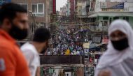 People are seen in a crowded marketplace amidst the spread of the coronavirus disease (COVID-19), in the old quarters of Delhi, India, April 14, 2021. REUTERS/Danish Siddiqui