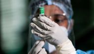 FILE PHOTO: A health official draws a dose of the AstraZeneca's COVID-19 vaccine manufactured by the Serum Institute of India, at Infectious Diseases Hospital in Colombo, Sri Lanka January 29, 2021. REUTERS/Dinuka Liyanawatte/File Photo
