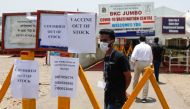 Notices about the shortage of COVISHIELD, a coronavirus disease (COVID-19) vaccine manufactured by Serum Institute of India, are seen outside a COVID-19 vaccination centre in Mumbai, India, April 20, 2021. REUTERS/Francis Mascarenhas