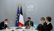 French President Emmanuel Macron attends a weekly meeting with Prime Minister Jean Castex, Secretary-General of the Elysee Palace Alexis Kohler, Government's spokesman Gabriel Attal, and Health Minister Olivier Veran, about the coronavirus disease (COVID-
