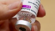 FILE PHOTO: A medical worker prepares a dose of Oxford/AstraZeneca's COVID-19 vaccine at a vaccination centre in Antwerp, Belgium March 18, 2021. REUTERS/Yves Herman/File Photo
