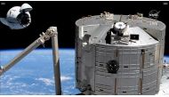 The SpaceX Crew Dragon approaches its space station docking port with the Kibo laboratory module in the foreground. Credit: NASA TV
