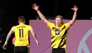 Borussia Dortmund's Erling Braut Haaland celebrates scoring their second goal with Marco Reus Pool via REUTERS/Ronny Hartmann
