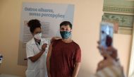 A man receives the Oxford-AstraZeneca coronavirus disease (COVID-19) vaccine, at the Catete Palace in Rio de Janeiro, Brazil April 23, 2021. REUTERS/Pilar Olivares

