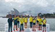 FILE PHOTO: Australian Olympians pose in front of the Sydney Opera House at the unveiling of the team uniforms for the 2020 Tokyo Olympics, in Sydney, Australia March 31, 2021. REUTERS/Nick Mulvenney/File Photo
