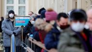 File photo: People line up to receive a dose of Sputnik V (Gam-COVID-Vac) vaccine against the coronavirus disease (COVID-19) at a vaccination centre in the State Department Store, GUM, in central Moscow, Russia January 18, 2021 Reuters/Shamil Zhumatov/Fil