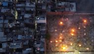 A mass cremation of victims who died due to the coronavirus disease (COVID-19), is seen at a crematorium ground in New Delhi, India, April 22, 2021. Picture taken with a drone. REUTERS/Danish Siddiqui TPX IMAGES OF THE DAY
