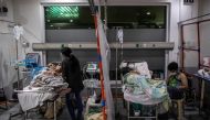 Patients are watched over by relatives and hospital aides inside the COVID-19 emergency room of the government hospital National Kidney and Transplant Institute, which has declared overcapacity amid rising coronavirus disease (COVID-19) infections in Quez
