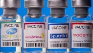 FILE PHOTO: Vials with Pfizer-BioNTech, AstraZeneca, Sputnik V, and Moderna coronavirus disease (COVID-19) vaccine labels are seen in this illustration picture taken March 19, 2021. REUTERS/Dado Ruvic/Illustration/File Photo
