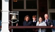 The family of Captain Sir Tom Moore, Hannah Ingram-Moore, Benjie Ingram-Moore, Georgia Ingram-Moore, and Colin Ingram-Moore, ring the bell at Lord's cricket ground, in London, Britain, April 30, 2021.