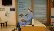 A woman waits to be vaccinated for the coronavirus disease (COVID-19) at a hospital, in New Delhi, India, May 1, 2021. Reuters/Adnan Abidi