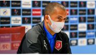 Al Duhail coach
Sabri Lamouchi
speaks during a
post-match press
conference.
