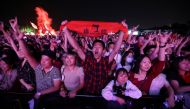 Fans attend a performance of a rock band at the Strawberry Music Festival during Labour Day holiday in Wuhan, Hubei Province, China May 1, 2021. REUTERS/Tingshu Wang