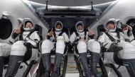 NASA astronauts Shannon Walker, left, Victor Glover, Mike Hopkins, and Japan Aerospace Exploration Agency (JAXA) astronaut Soichi Noguchi react inside the SpaceX Crew Dragon Resilience spacecraft onboard the SpaceX GO Navigator recovery ship shortly after