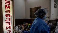 A patient suffering from the coronavirus disease (COVID-19) receives treatment inside the emergency ward at Holy Family hospital in New Delhi, India, April 29, 2021. REUTERS/Danish Siddiqui
