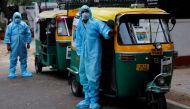Drivers stand near auto rickshaw ambulances, prepared to transfer people suffering from the coronavirus disease (COVID-19) and their relatives for free, in New Delhi, India May 5, 2021. Picture taken May 5, 2021. REUTERS/Adnan Abidi