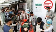 An injured woman is transported to a hospital after a blast in Kabul, Afghanistan May 8, 2021. (Reuters/Mohammad Ismail)