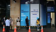 People wait in line at a coronavirus disease (COVID-19) testing clinic in the city centre after new cases were reported in Sydney, Australia, May 6, 2021. REUTERS/Loren Elliott
