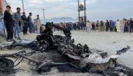 People stand at the site of a blast in Kabul, Afghanistan May 8, 2021. Reuters/Stringer